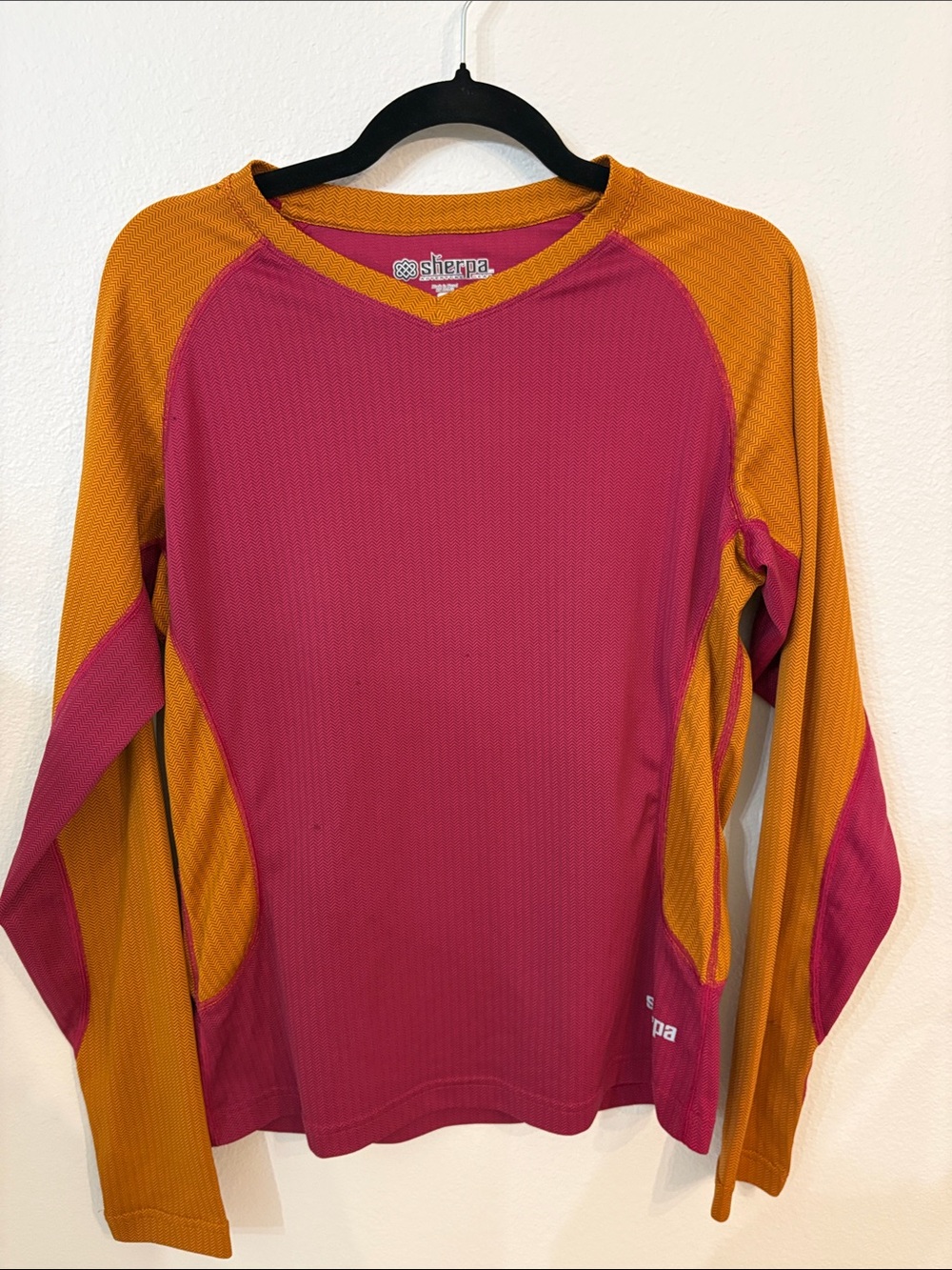 Sherpa Adventure Gear Colorblock V-Neck Top in Rose Pink & Mustard